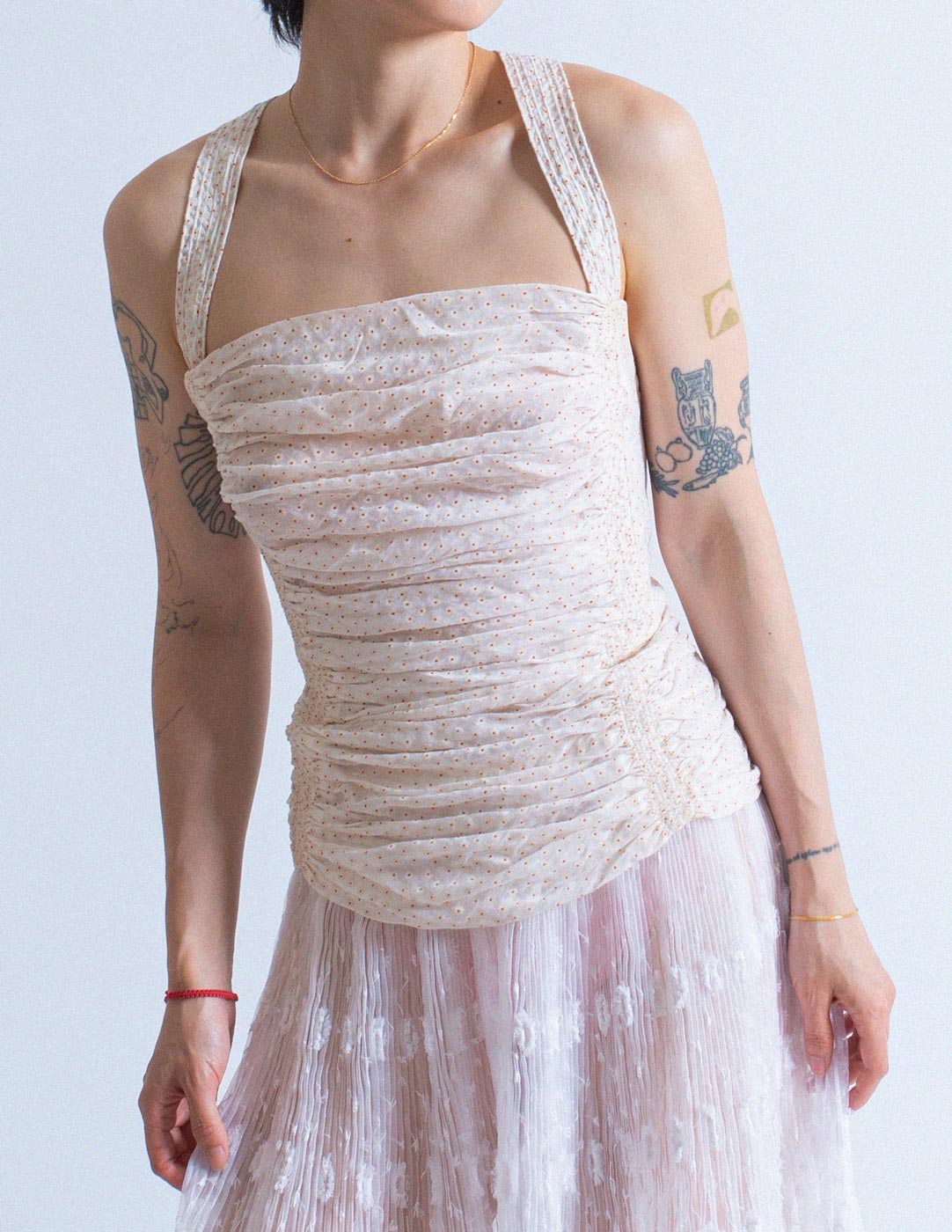 Alaïa smocked cotton corset with crossed back detail