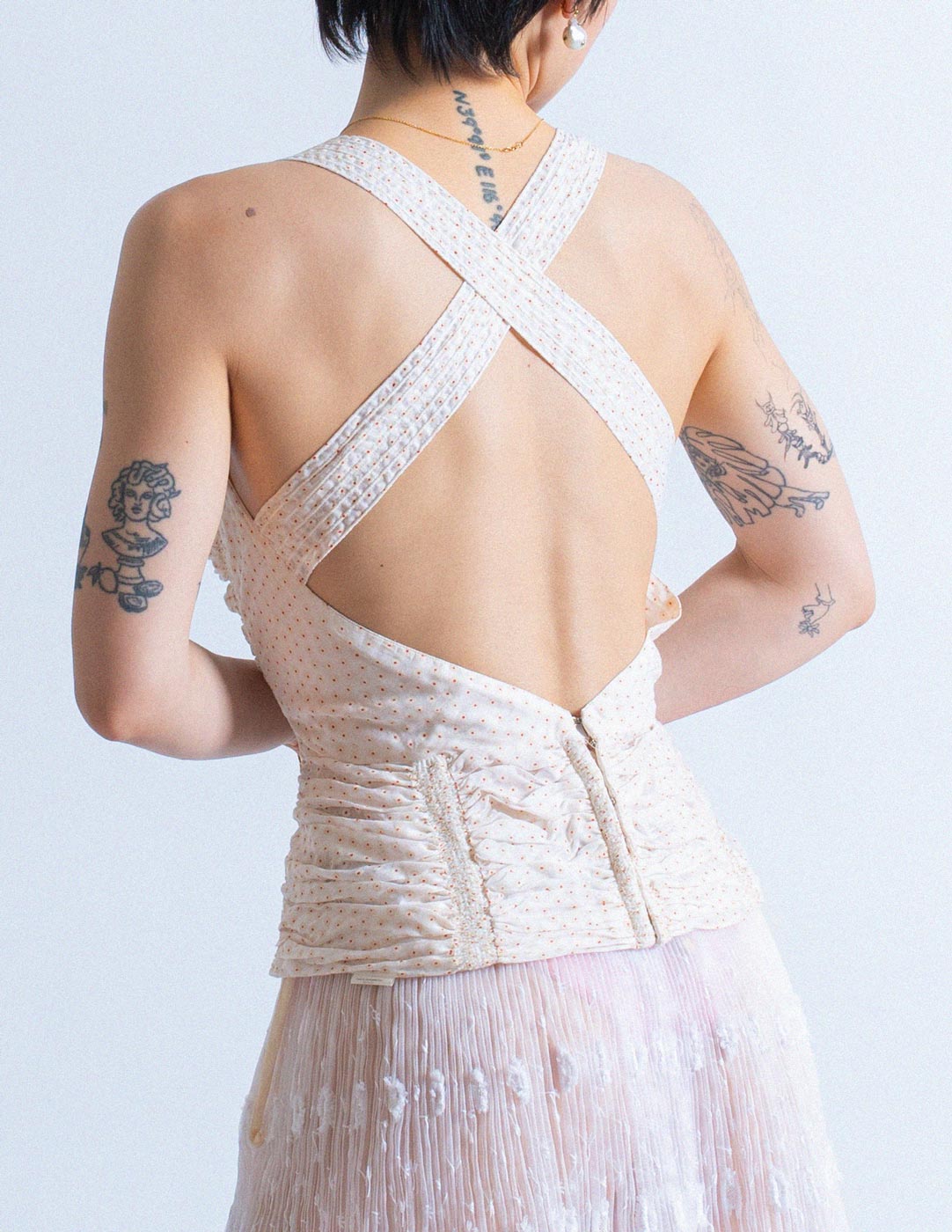 Alaïa smocked cotton corset with crossed back back detail