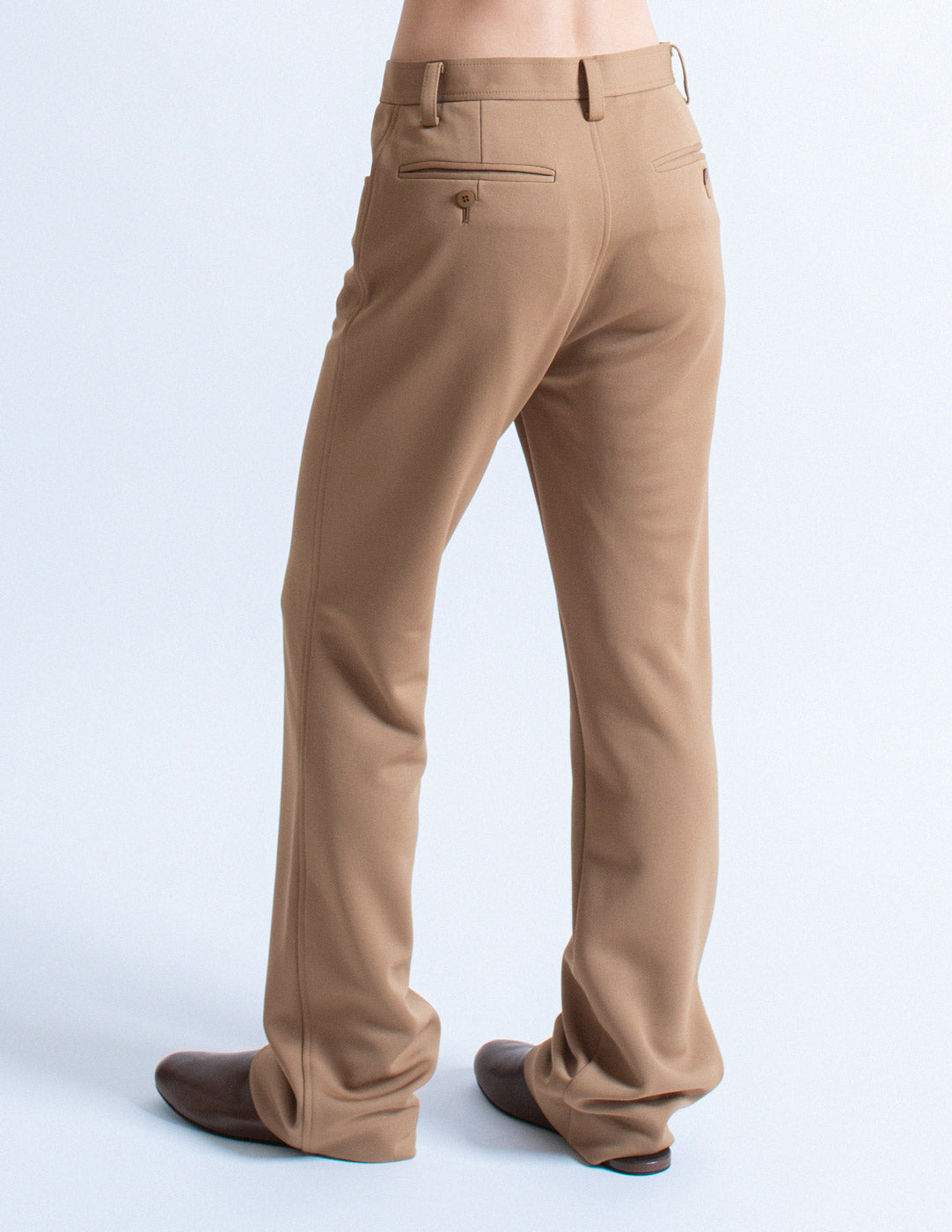 Issey Miyake camel tone long blazer and trousers set trousers detail