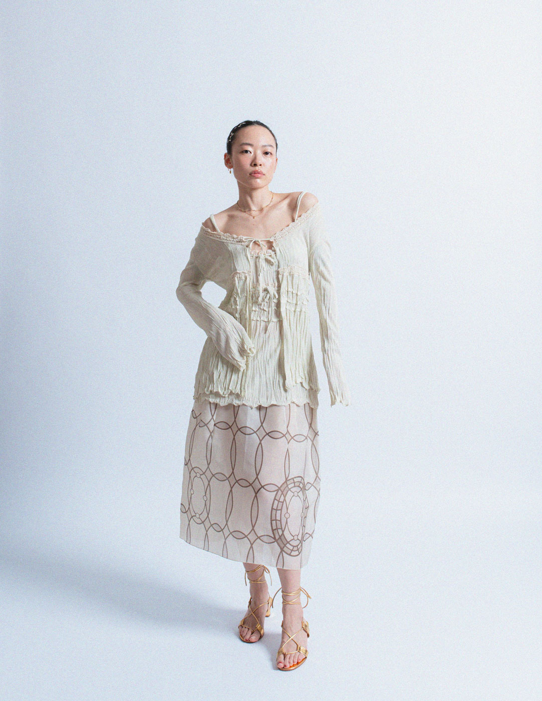 John Galliano ruffled camisole and cardigan set with lace trim