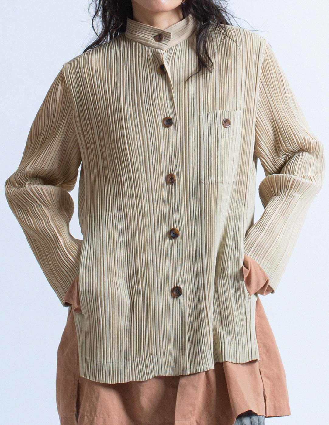 Issey Miyake beige pleated stand collar jacket detail