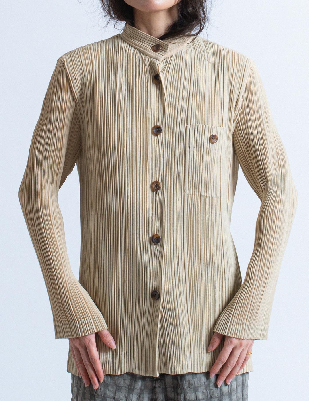 Issey Miyake beige pleated stand collar jacket front detail