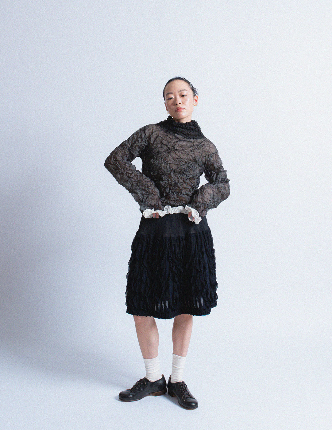 Issey Miyake black crinkled long sleeves