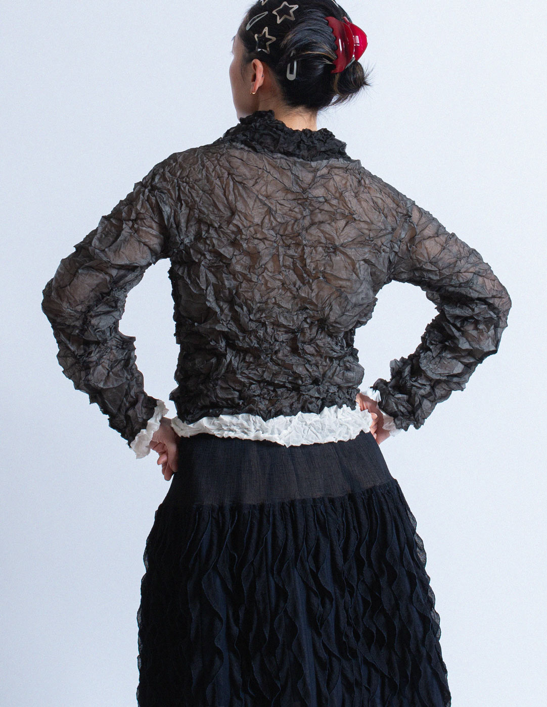 Issey Miyake black crinkled long sleeves back detail