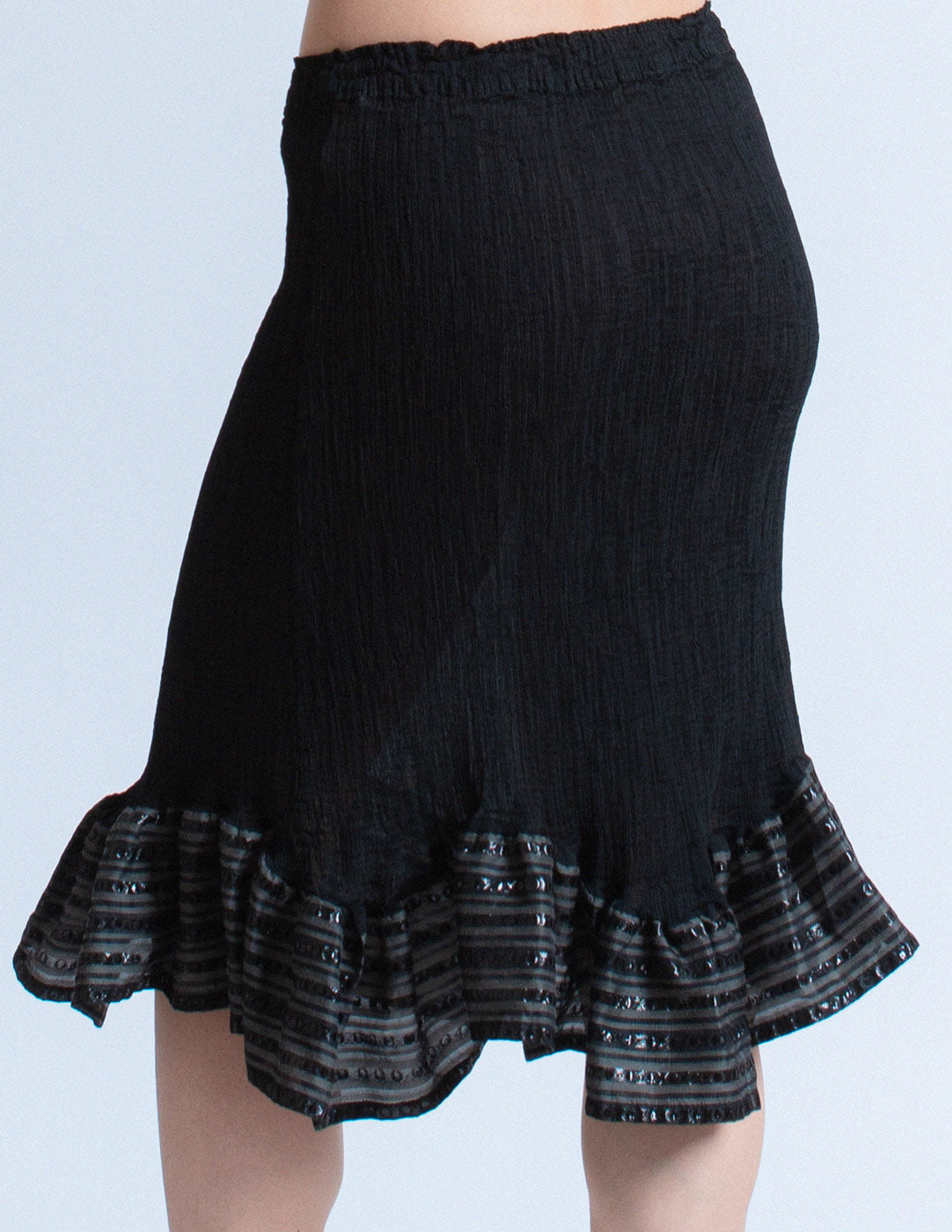 Issey Miyake me black pleated skirt with striped ruffle trim detail