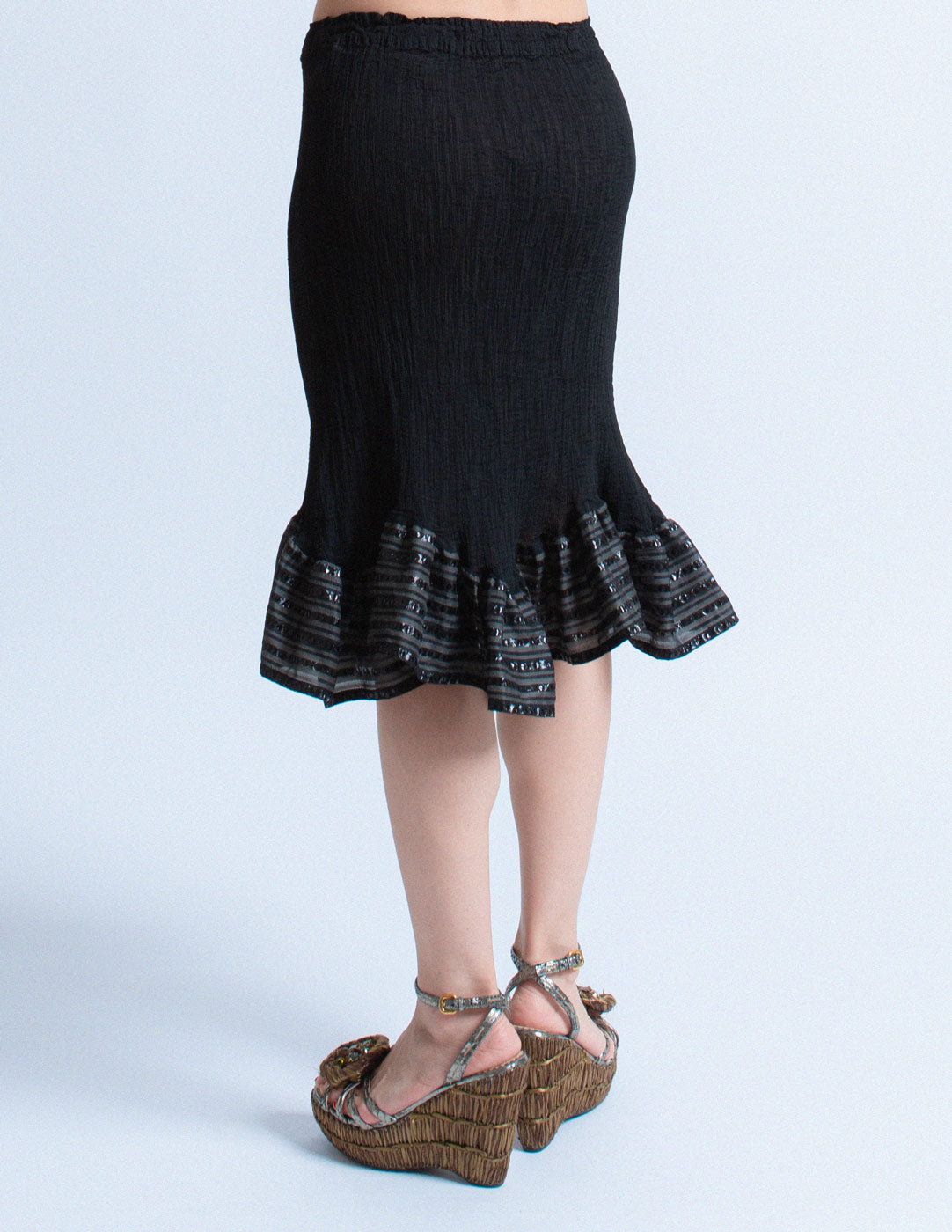 Issey Miyake me black pleated skirt with striped ruffle trim back detail