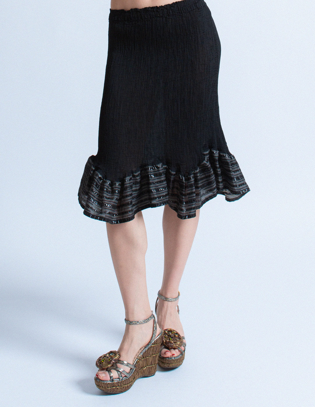 Issey Miyake me black pleated skirt with striped ruffle trim front detail