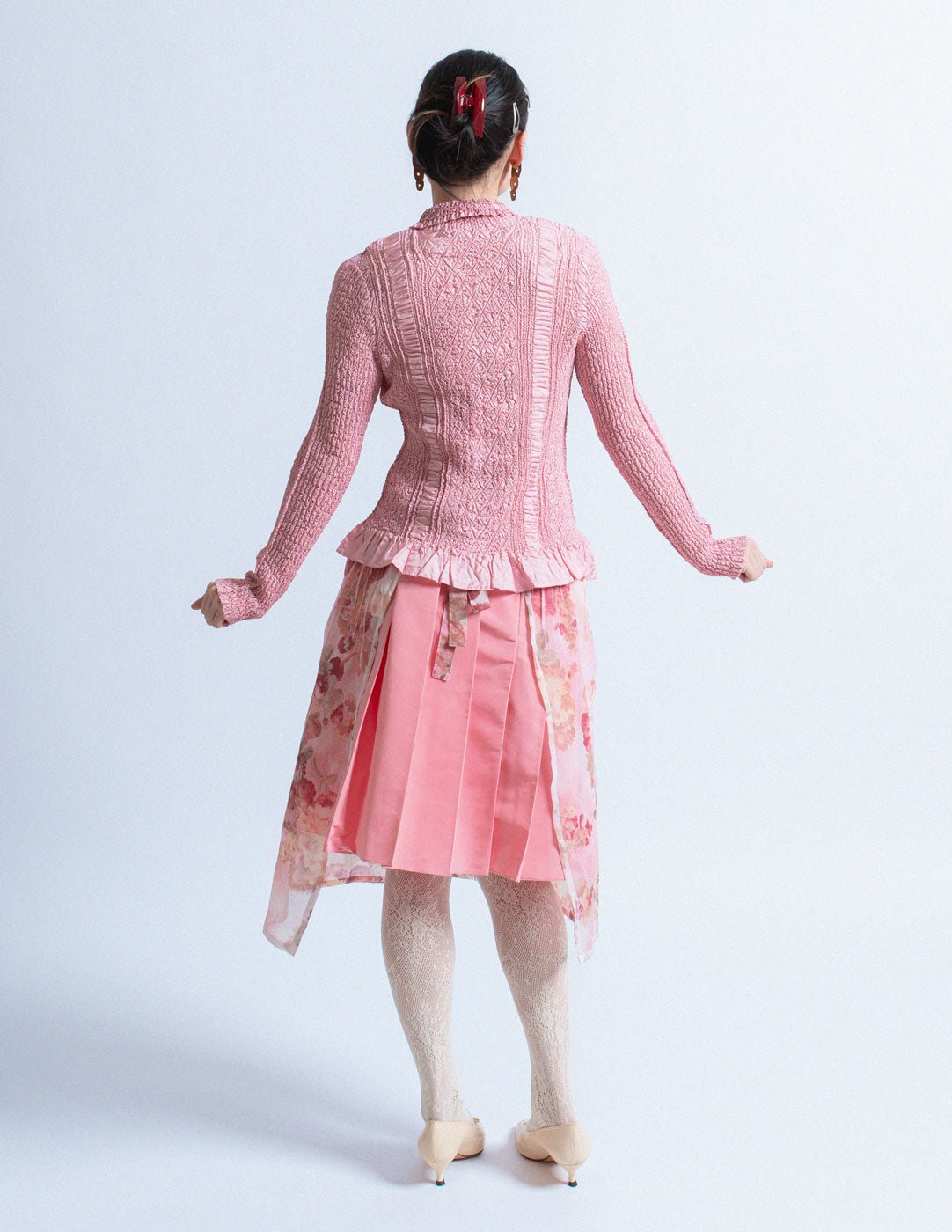 Yoshiki Hishinuma Peplum pink crinkled button-up top back view