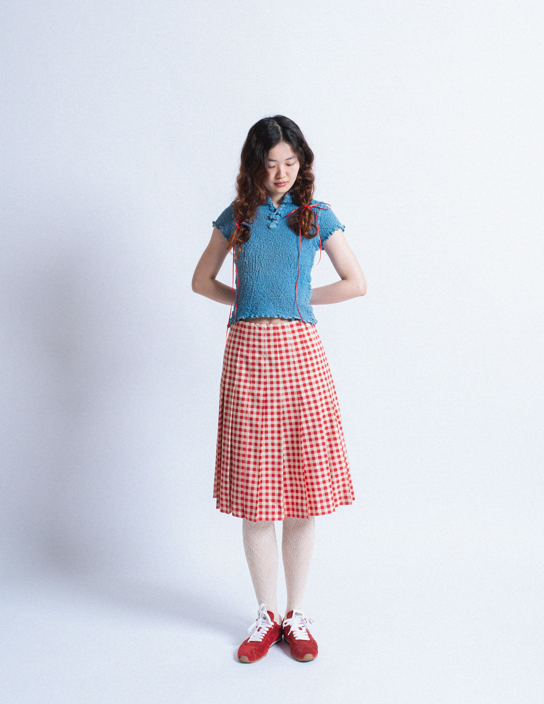 red and white gingham pleated skirt