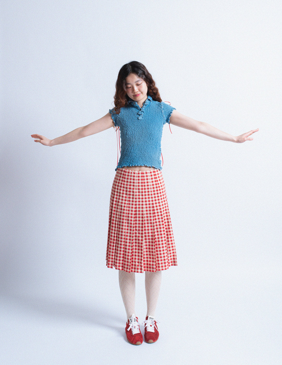 red and white gingham pleated skirt