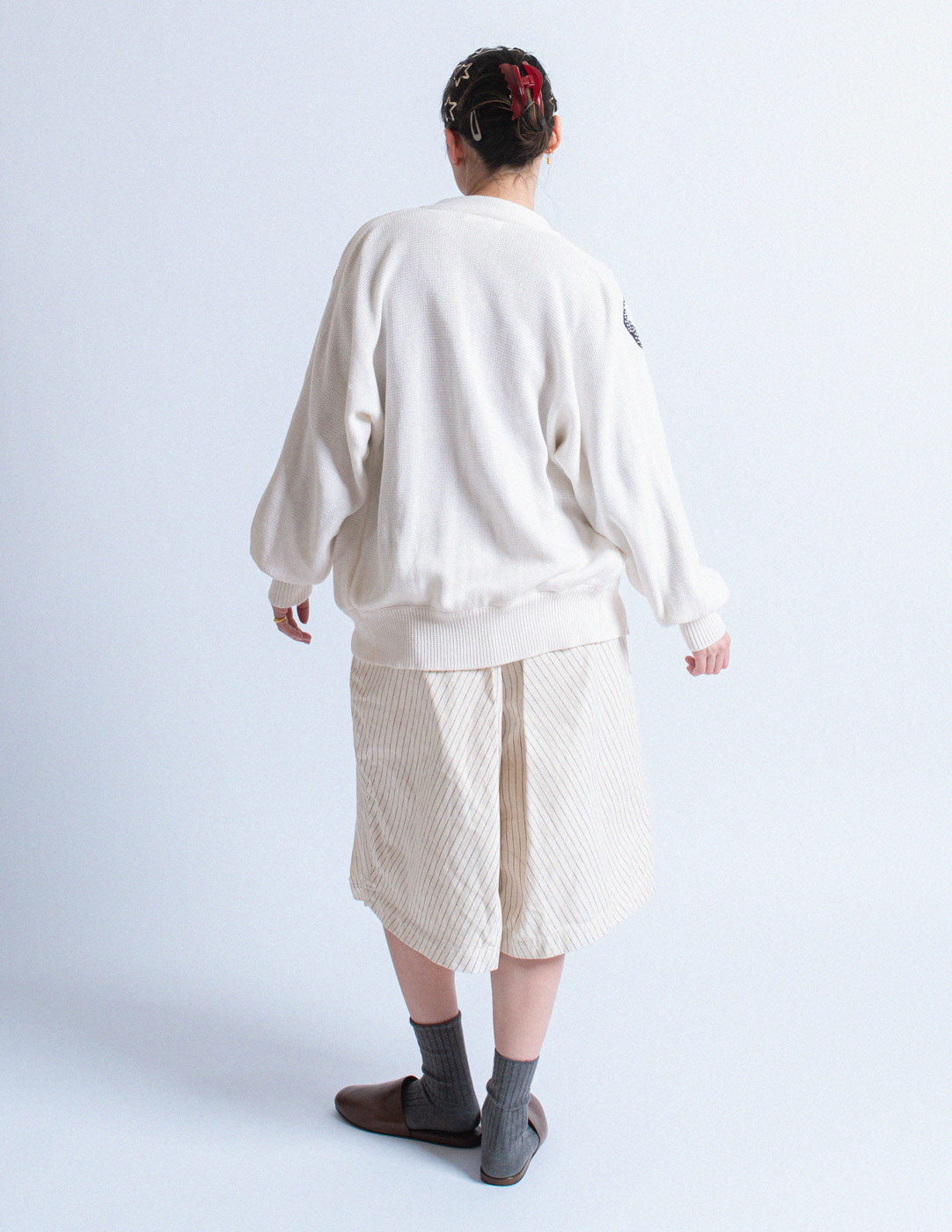 Vintage white cotton cardigan with beaded ribbon design back view