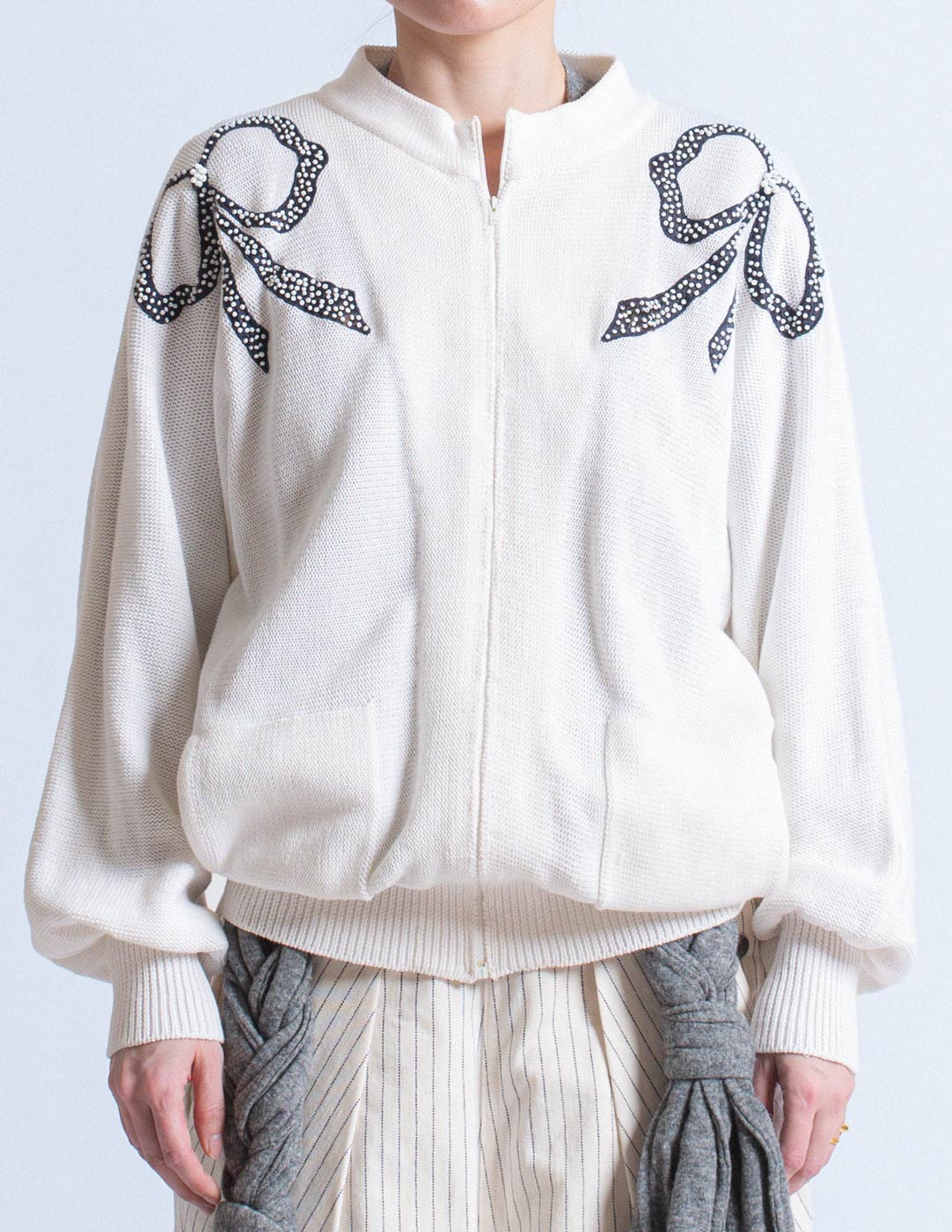 Vintage white cotton cardigan with beaded ribbon design front detail