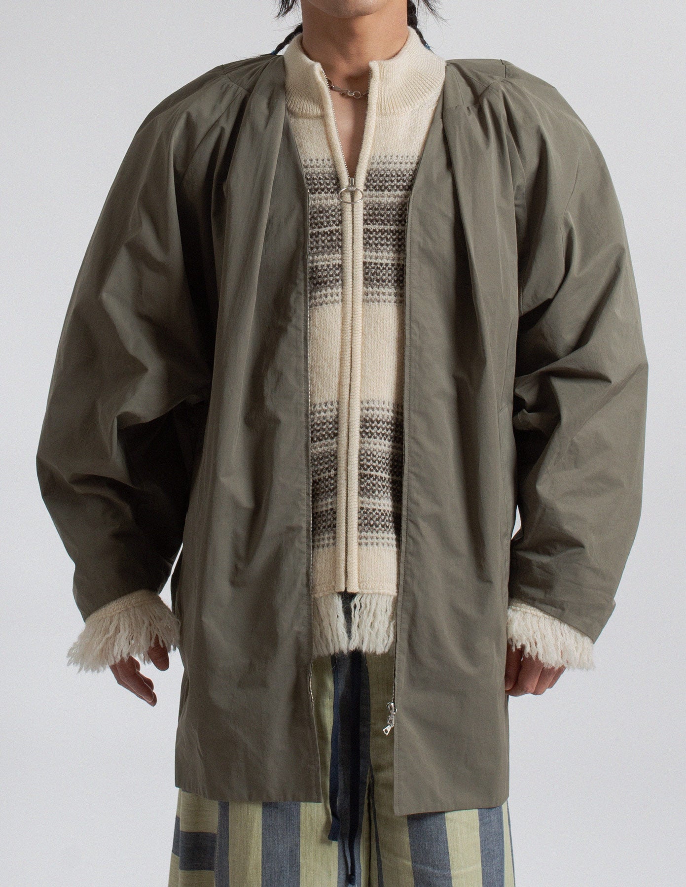 Dries Van Noten olive-toned sculptural cocoon jacket open detail