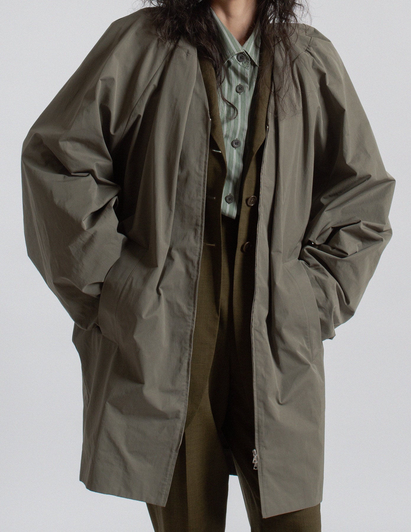 Dries Van Noten olive-toned sculptural cocoon jacket open detail