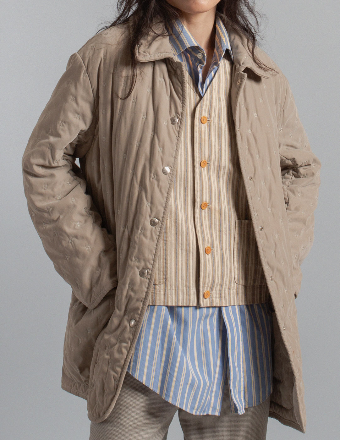 Hermès vintage warm gray quilted coat with embroidered motif detail