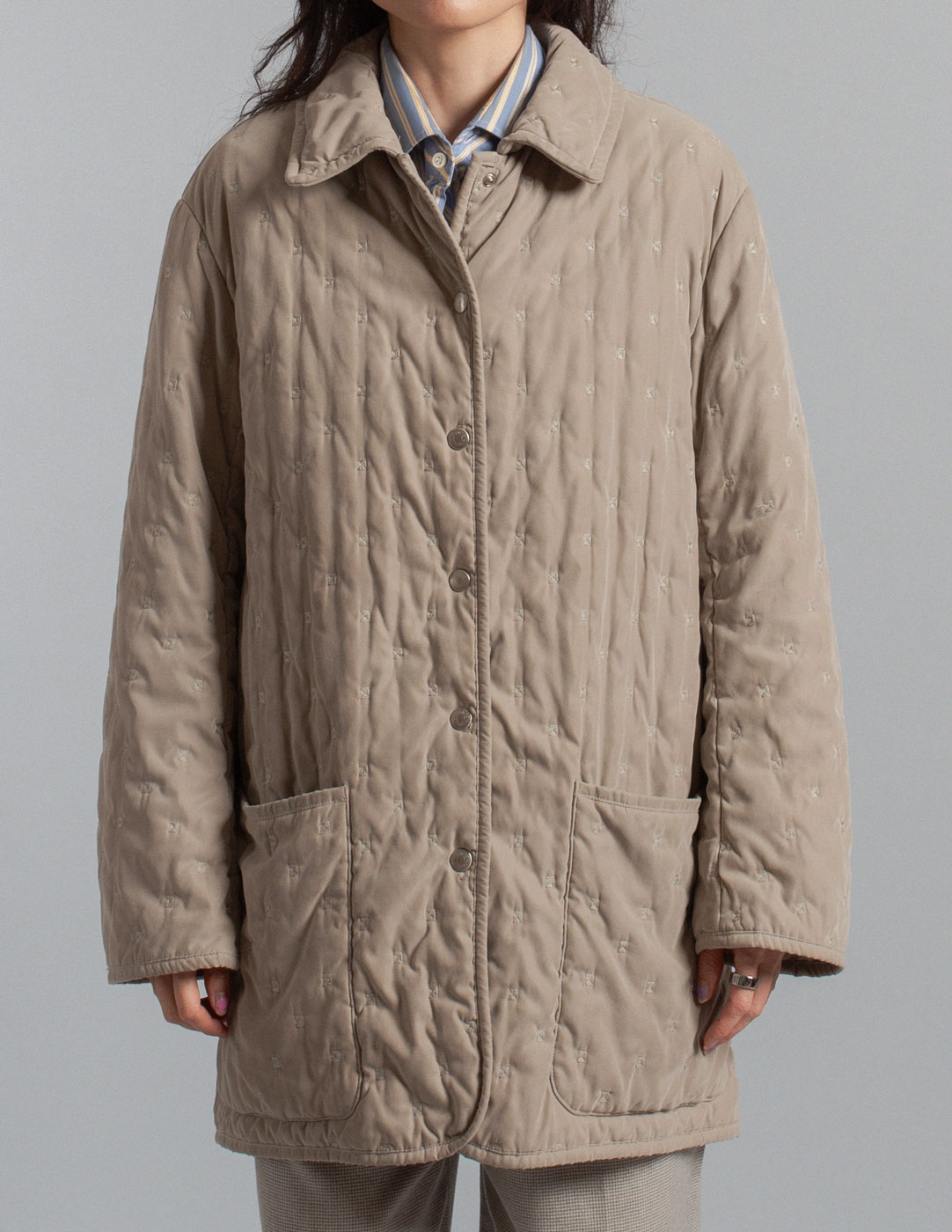 Hermès vintage warm gray quilted coat with embroidered motif detail