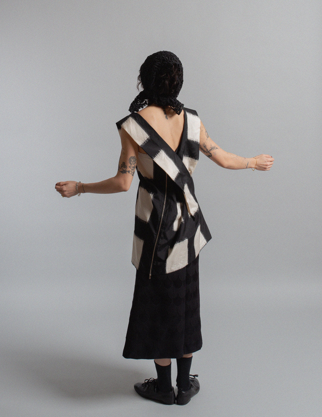black and ivory crisscross silk top