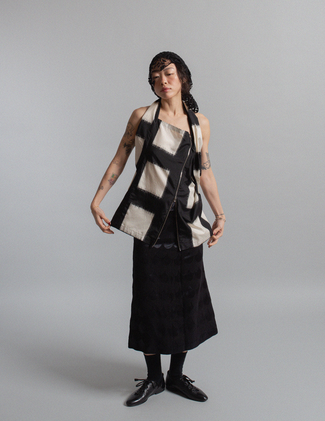 black and ivory crisscross silk top