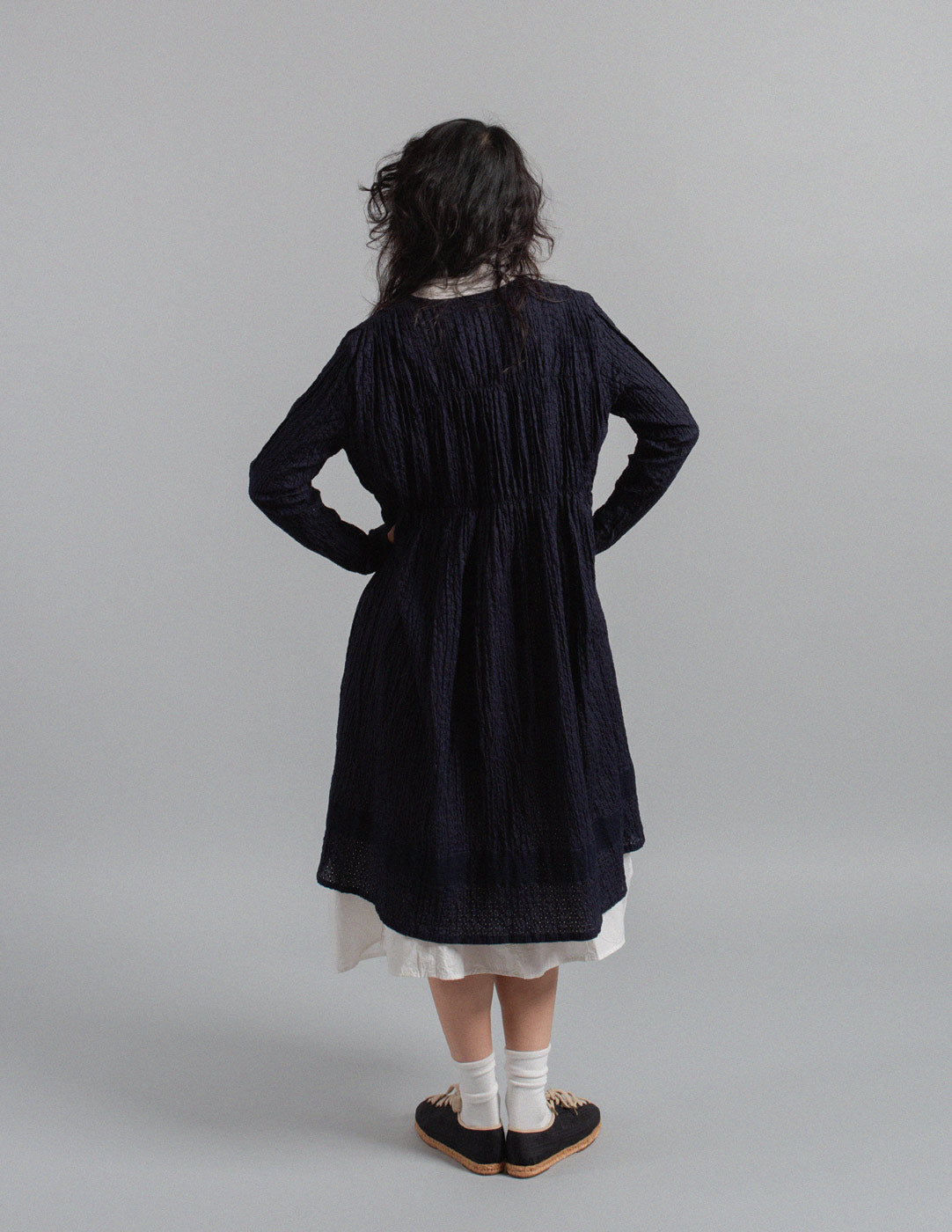 Issey Miyake navy textured crinkle cotton tie-neck gathered dress jacket back view