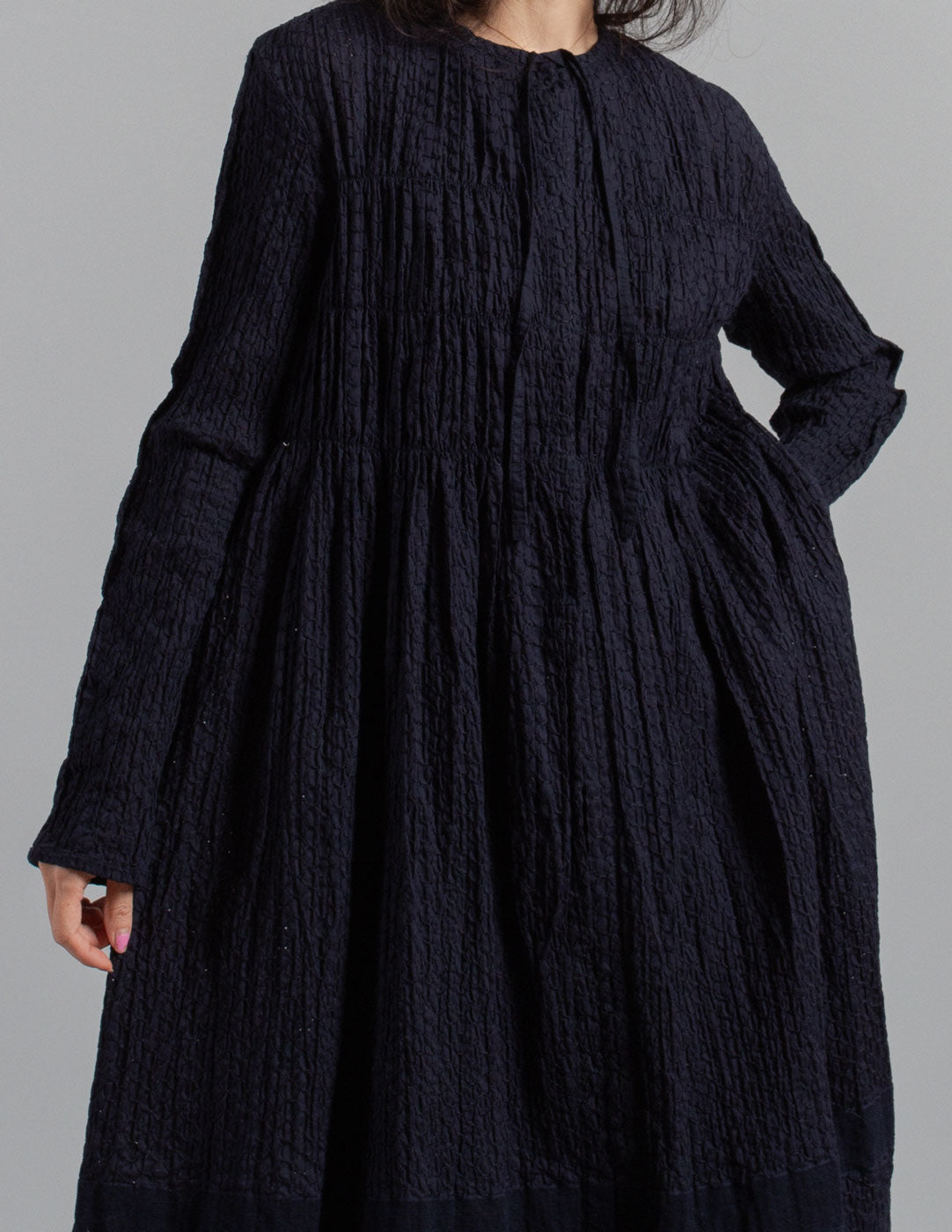 Issey Miyake navy textured crinkle cotton tie-neck gathered dress jacket detail