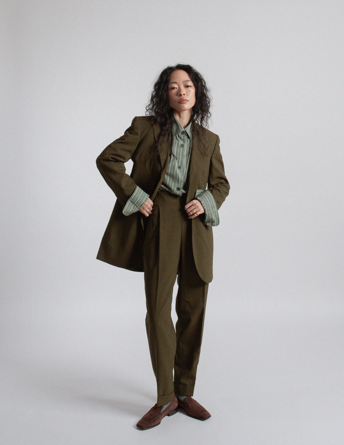 Dries Van Noten sage green striped button-up shirt layered view