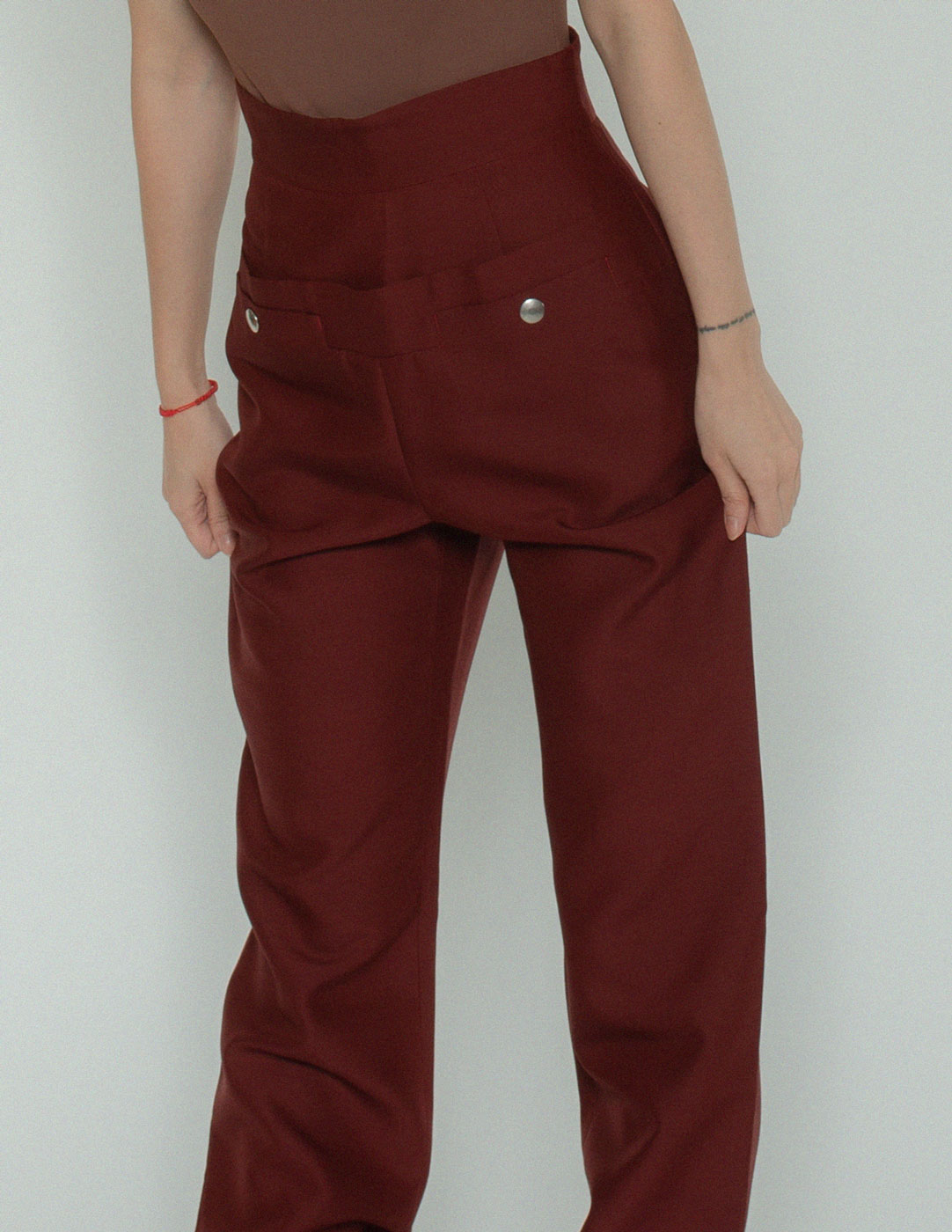 Jean Paul Gaultier burgundy high waisted trousers pocket detail