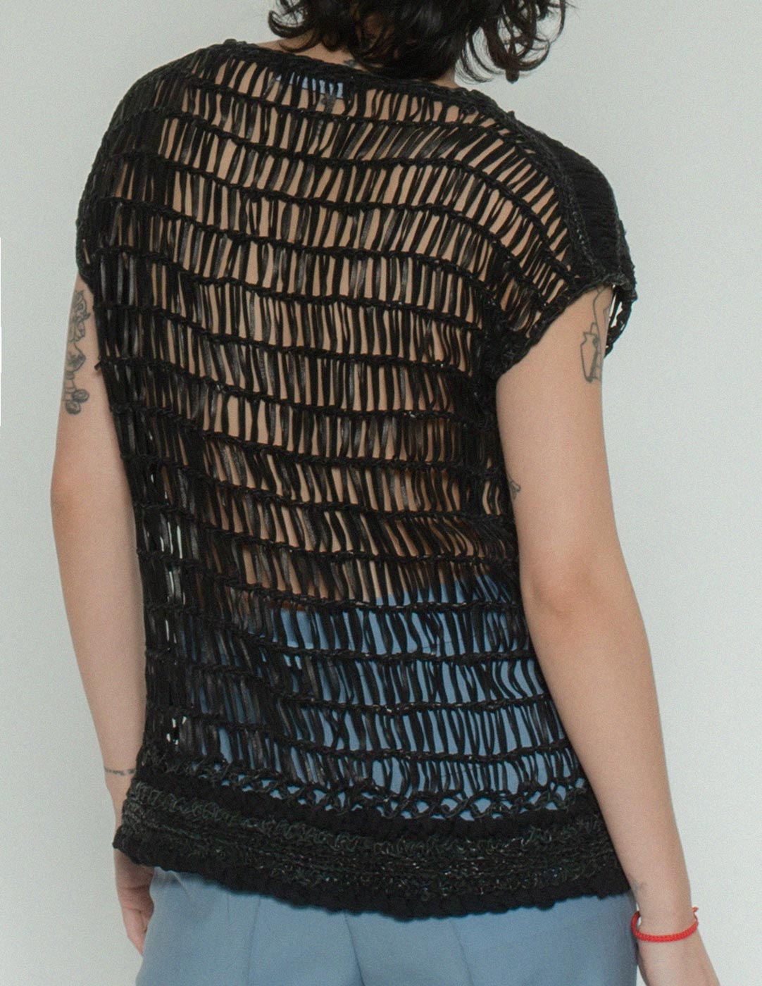 Gucci leather woven top with silk trim back detail