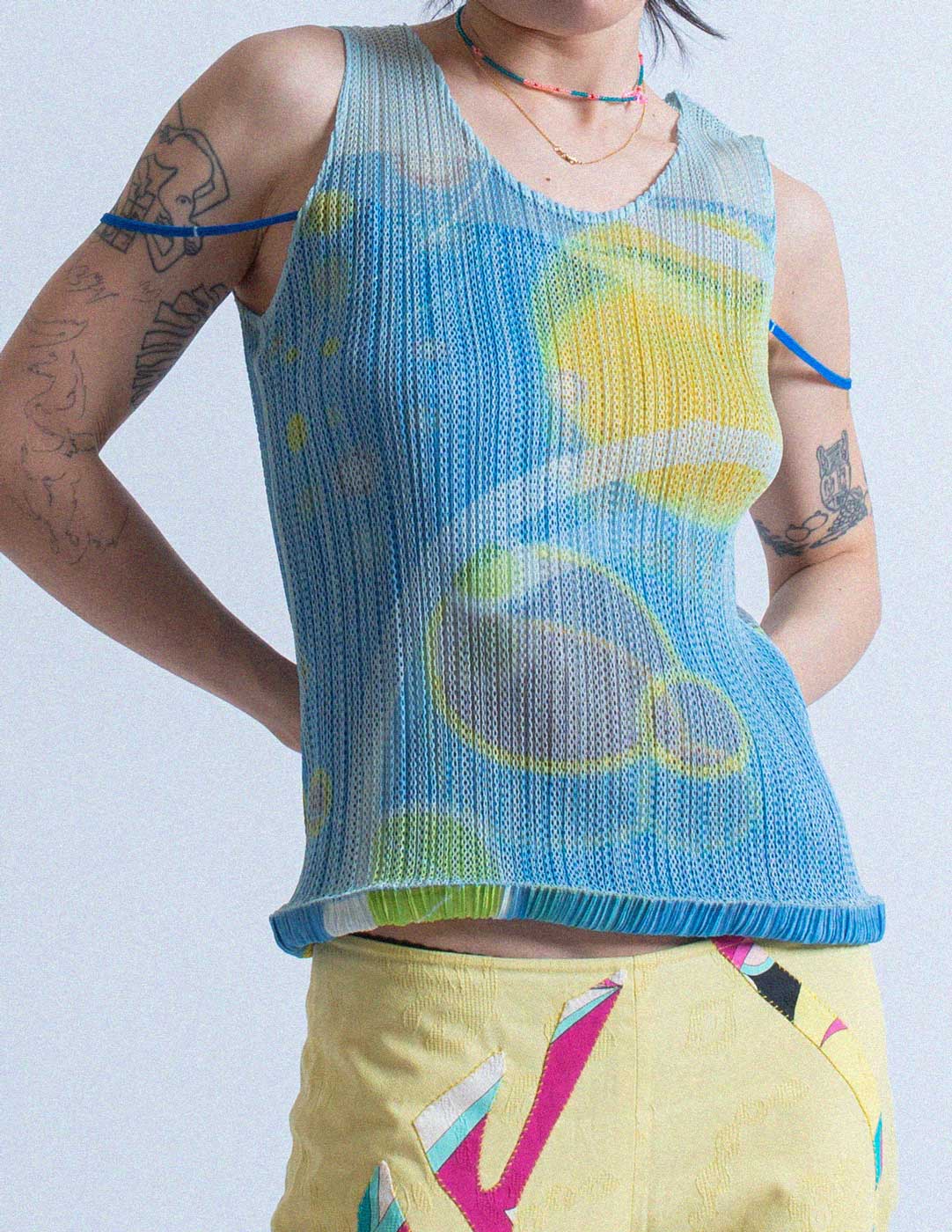 Pleats Please planet print pleated layered tank front detail
