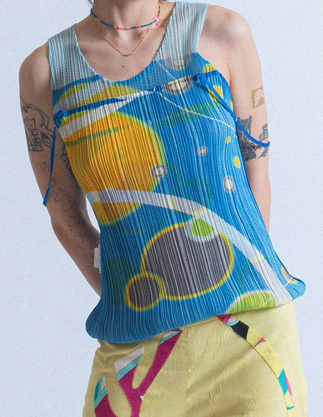 Pleats Please planet print pleated layered tank inside out