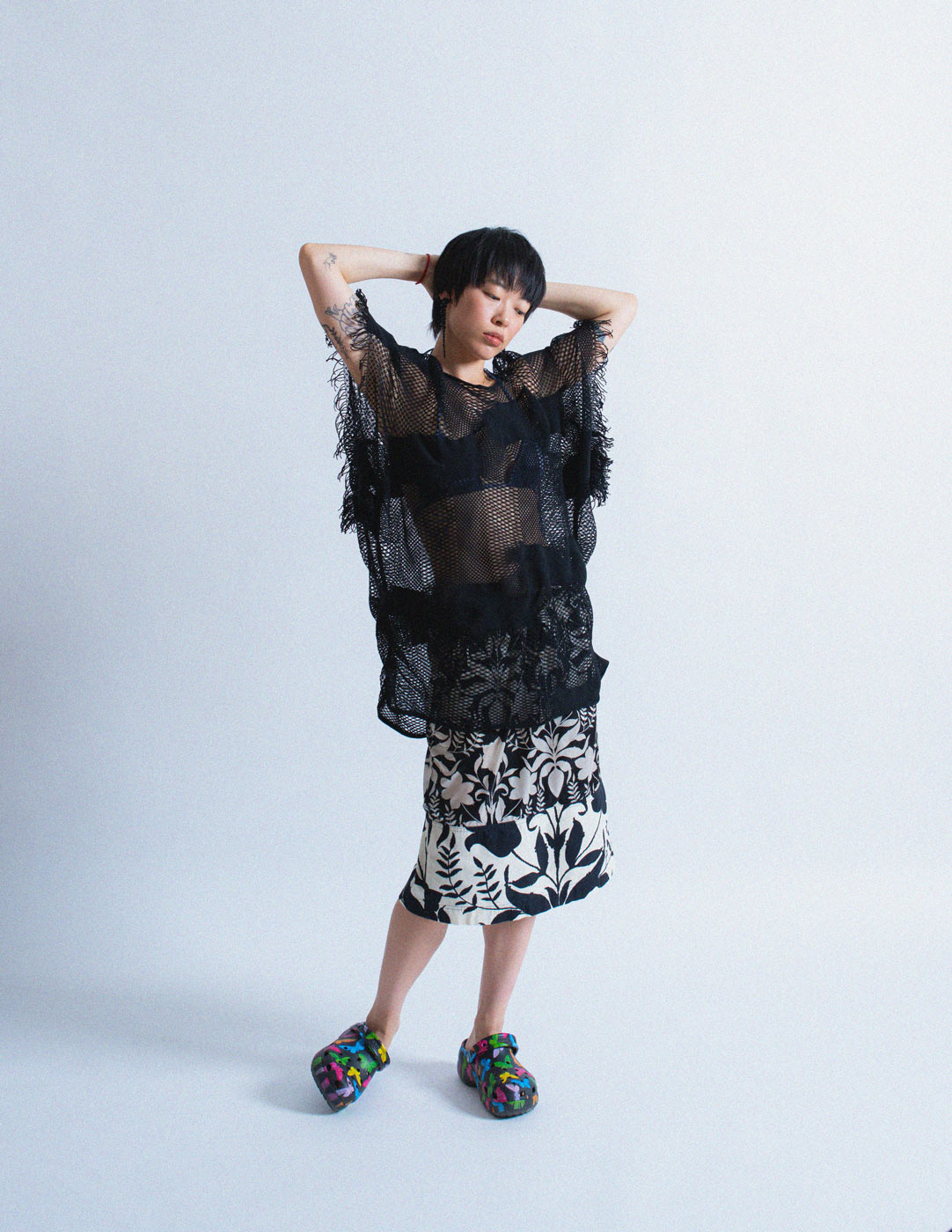 Issey Miyake net coverup with fringes