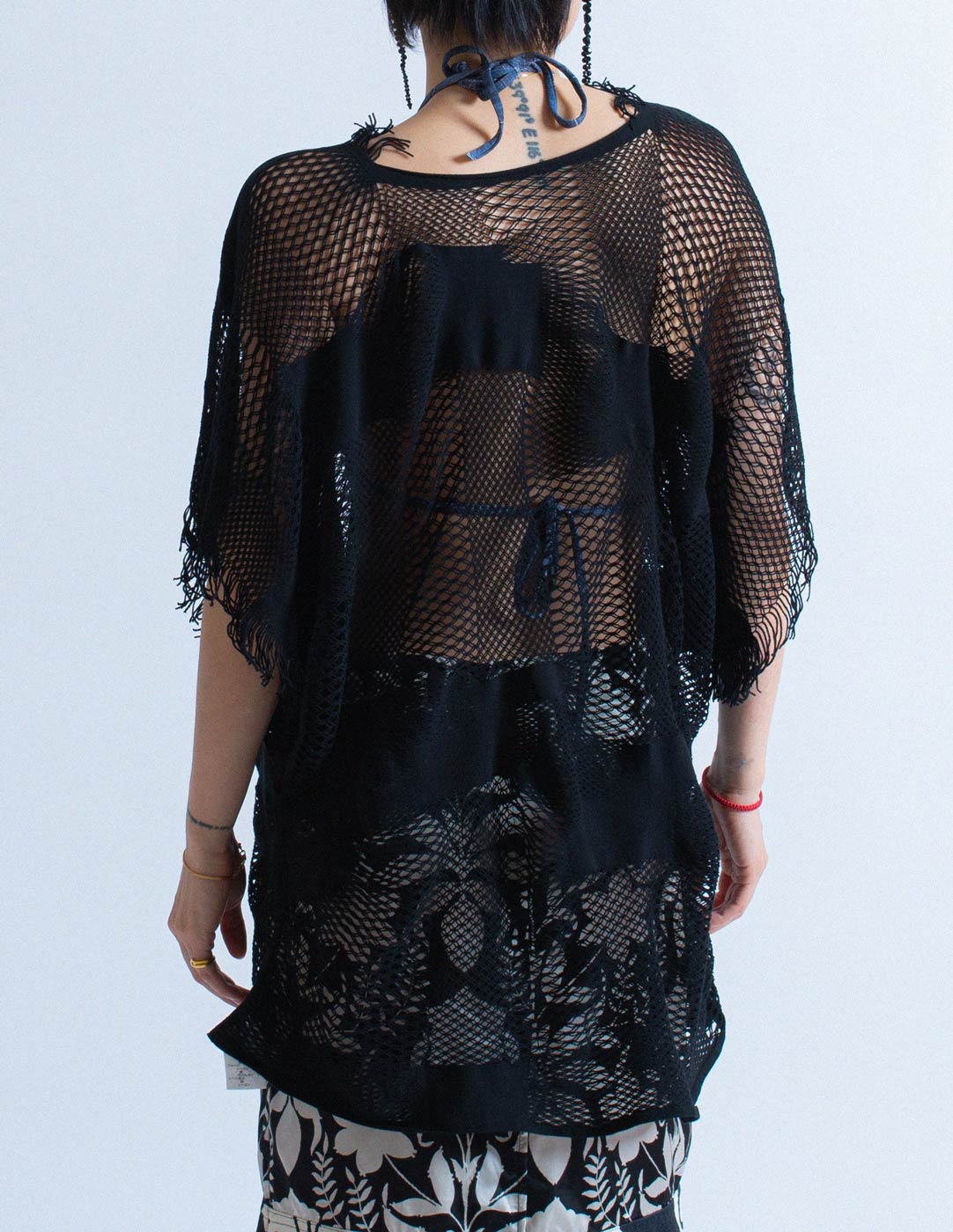 Issey Miyake net coverup with fringes back detail