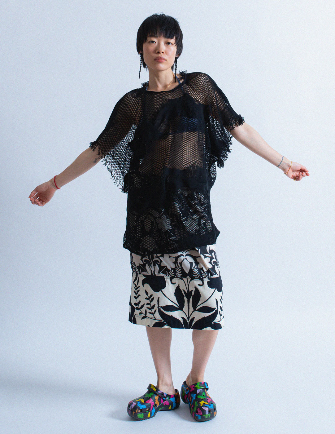 Issey Miyake net coverup with fringes