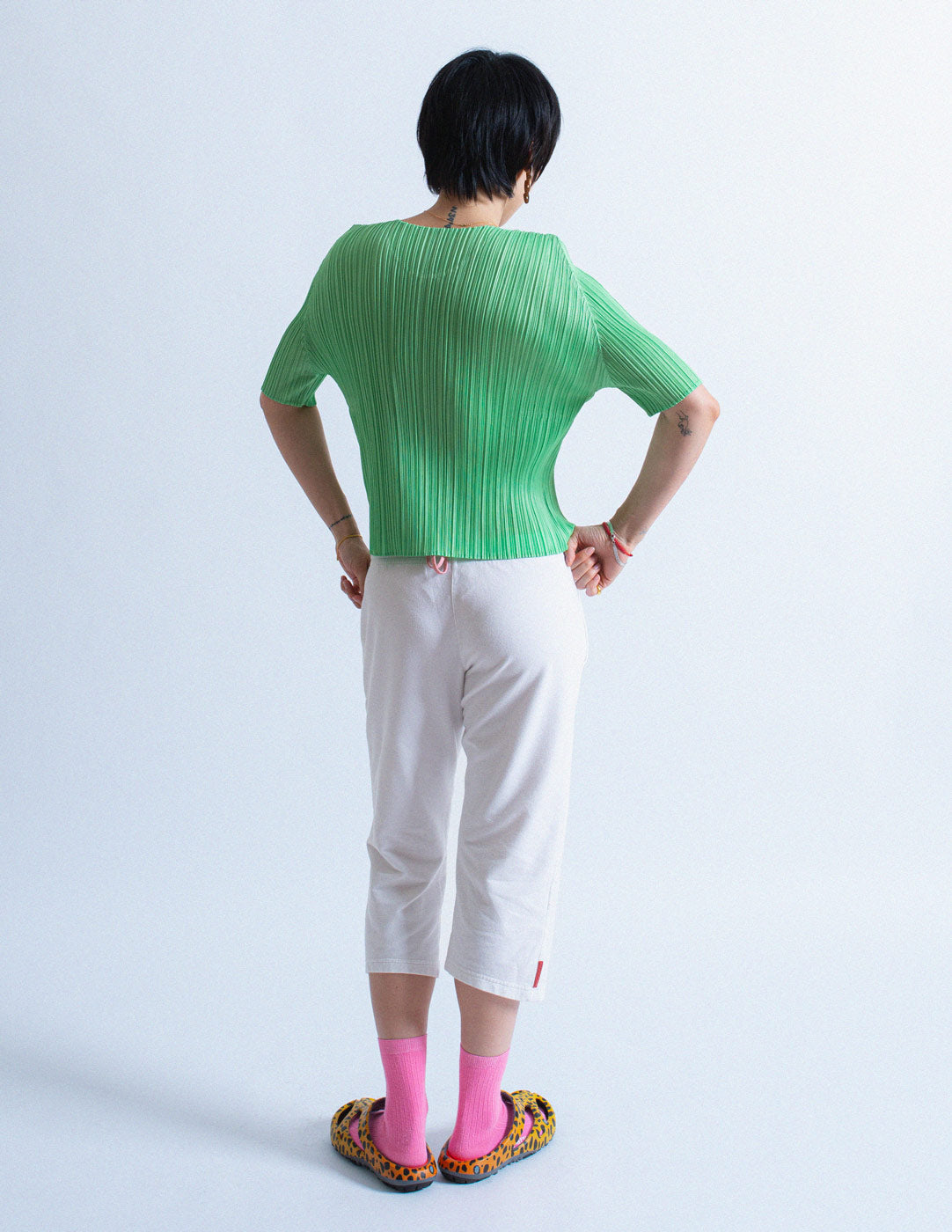 Issey Miyake green pleated short sleeves back view