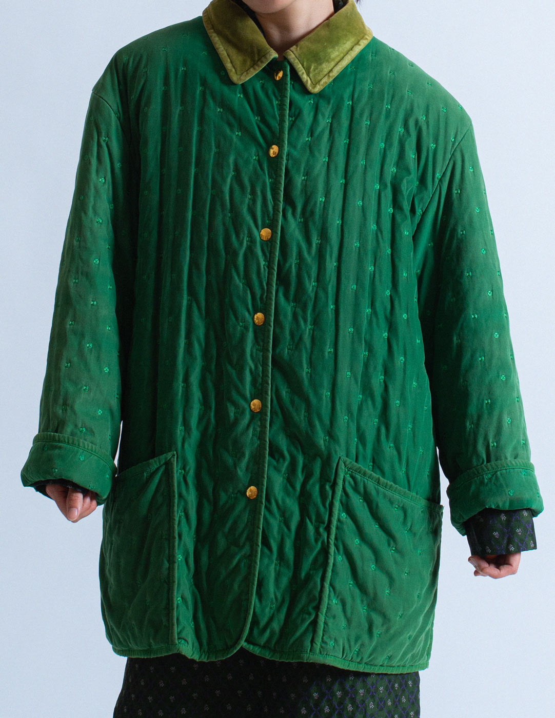 Hermès vintage green quilted coat detail