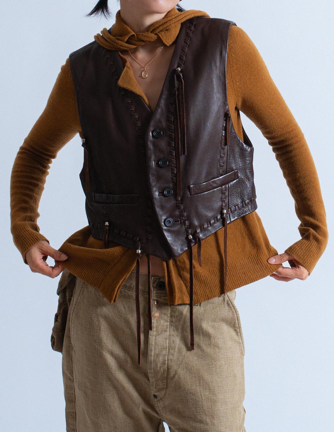 Issey Miyake vintage chocolate leather vest with tassels front detail