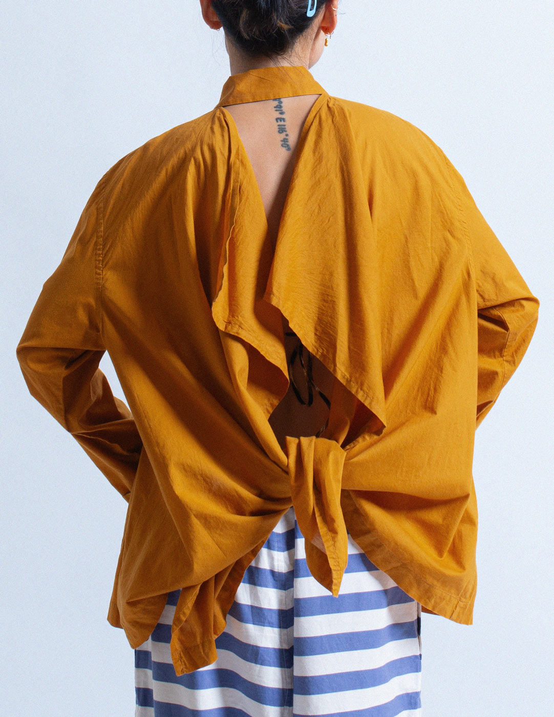 Romeo Gigli vintage burnt orange shirt with an open back detail