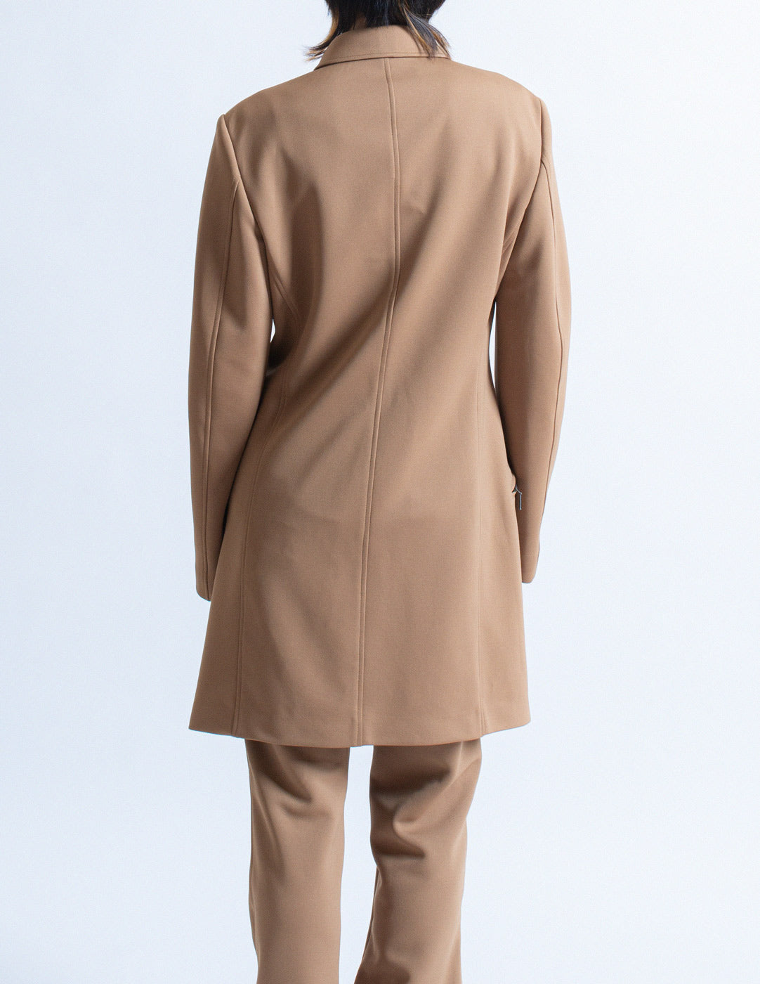 Issey Miyake camel tone long blazer and trousers set back detail