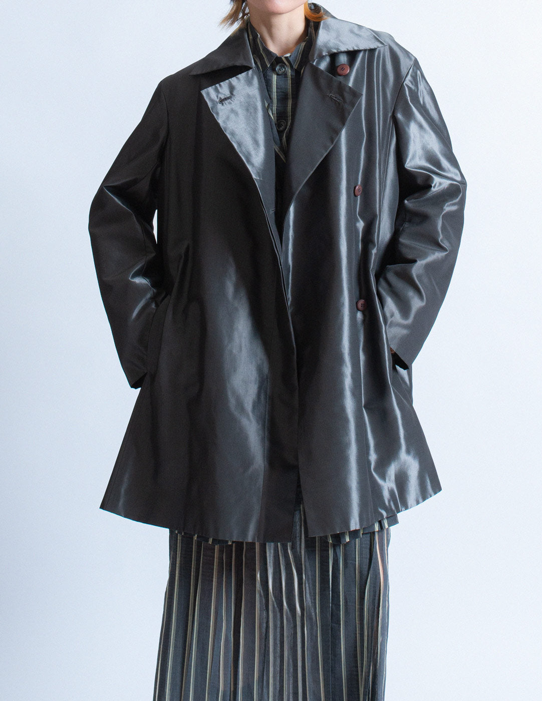 Issey Miyake iridescent slate swing coat front detail