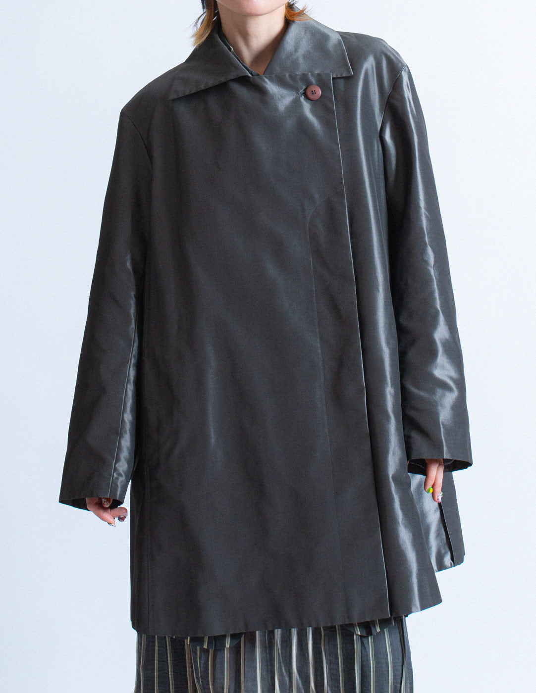Issey Miyake iridescent slate swing coat front detail