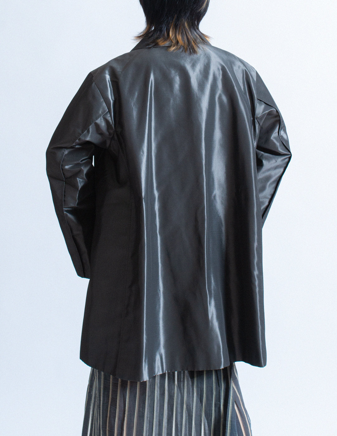 Issey Miyake iridescent slate swing coat back detail