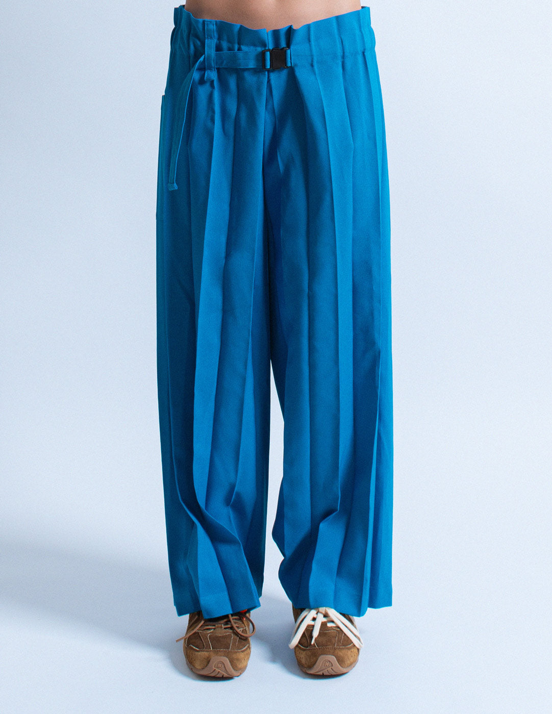 Issey Miyake blue pleated trousers front detail