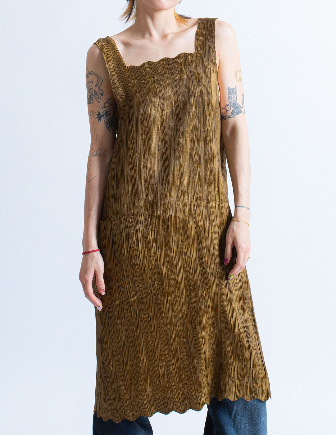 Issey Miyake bronze pleated apron dress front detail