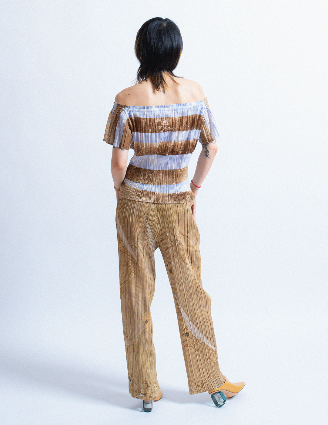 Pleats Please vintage khaki pleated trompe l'oeil trousers back view