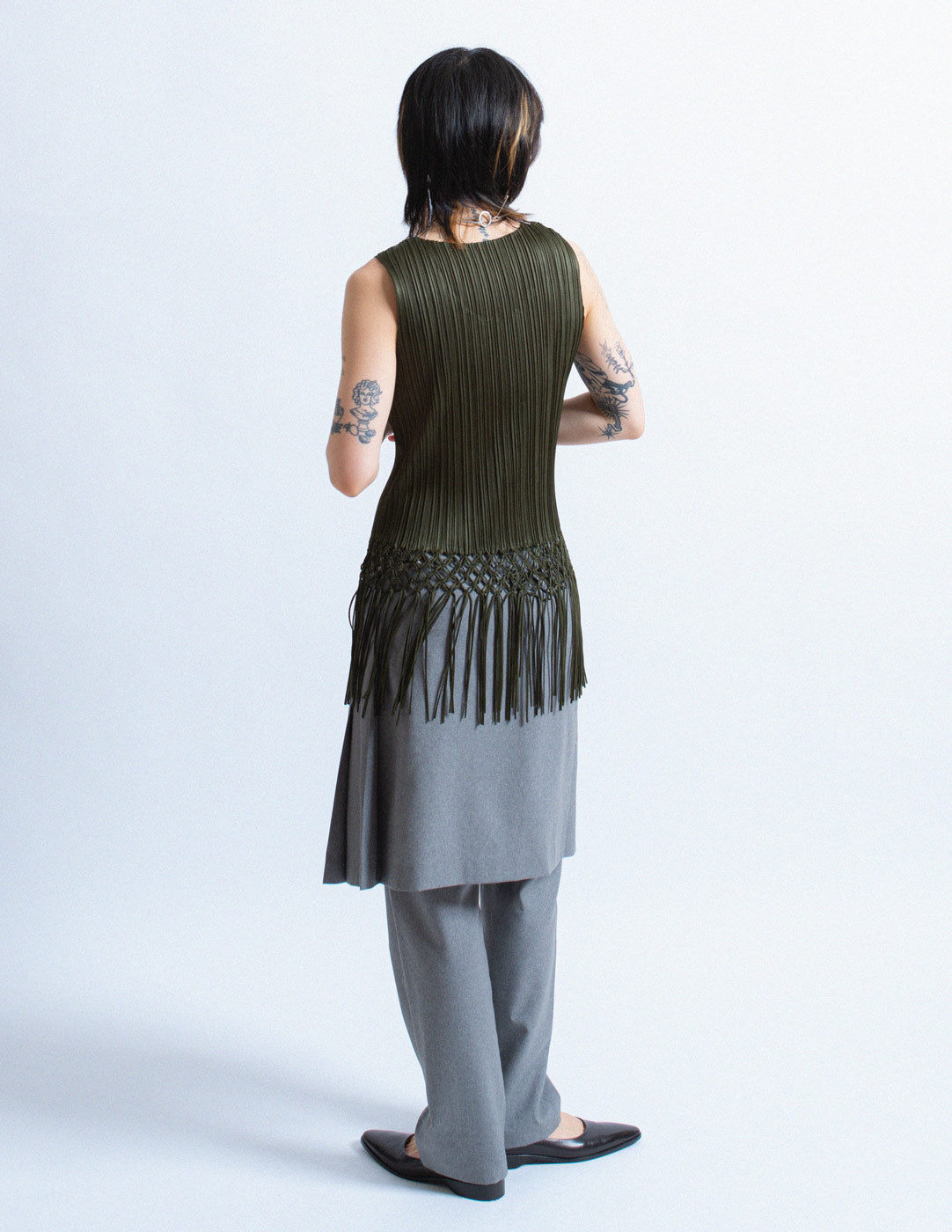 Pleats Please olive green pleated tank with woven tassels back view