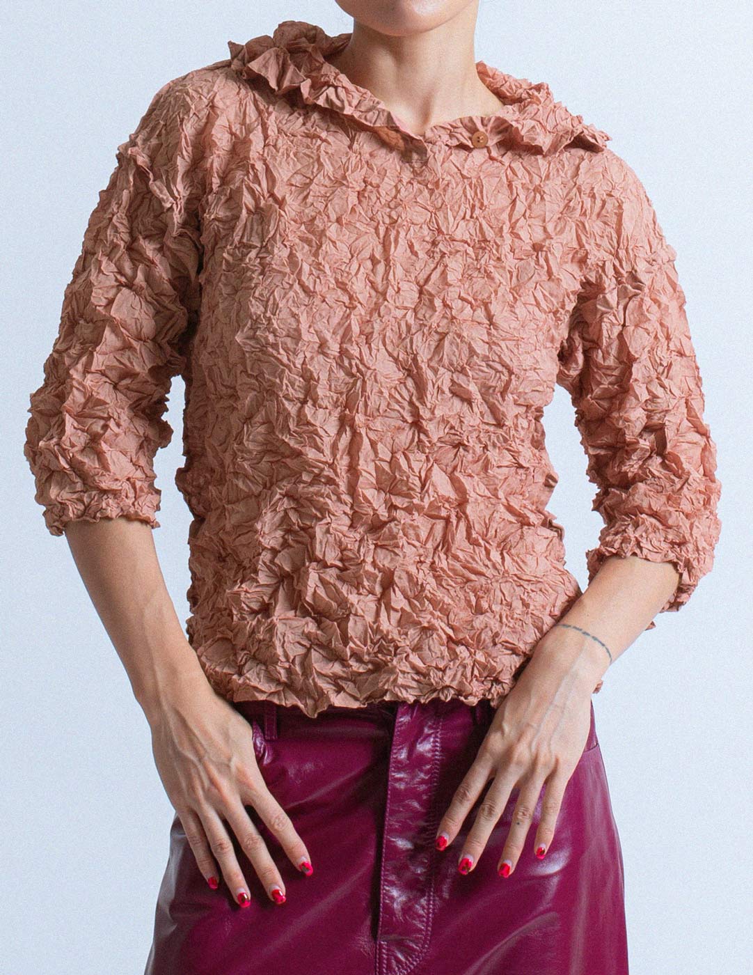 Issey Miyake persimmon tone crinkled top front detail