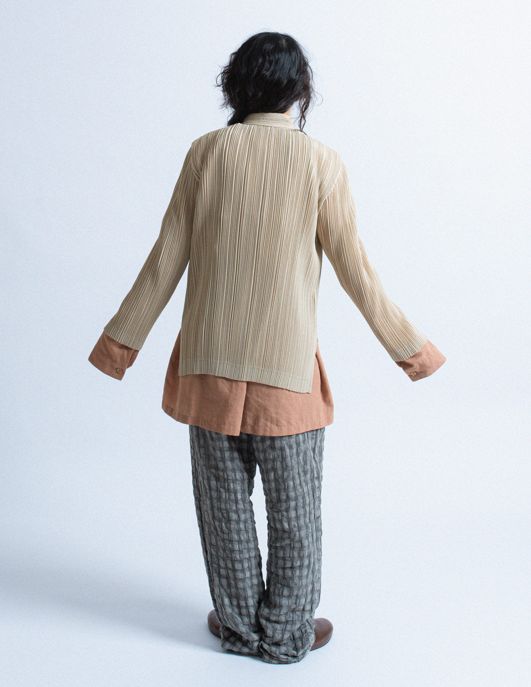 Issey Miyake beige pleated stand collar jacket back view