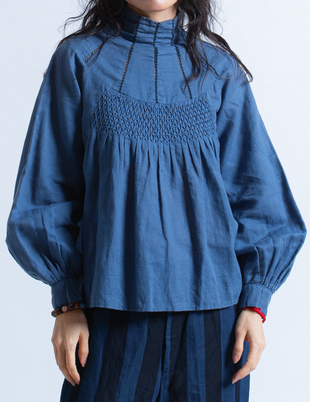 Kapital indigo blue smocked cotton linen blouse front detail