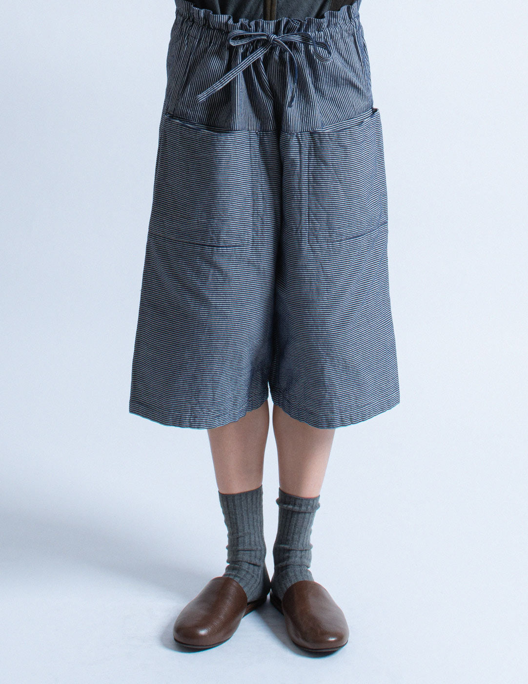Issey Miyake navy pinstripe drawstring wide legged shorts front detail