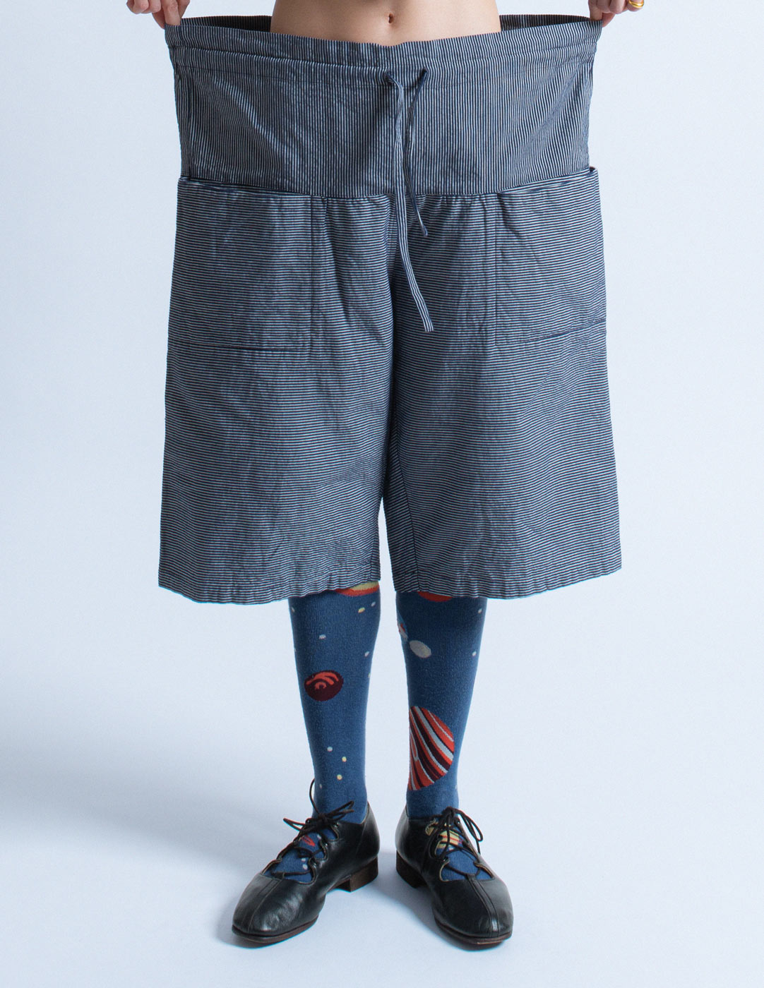 Issey Miyake navy pinstripe drawstring wide legged shorts detail