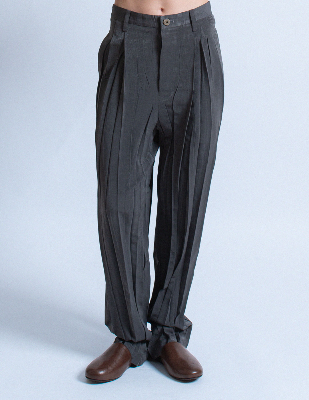 Issey Miyake charcoal gray pleated trousers front detail